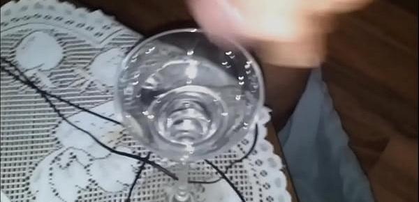  ten thick squirts of hot cum in a glass with slowmotion